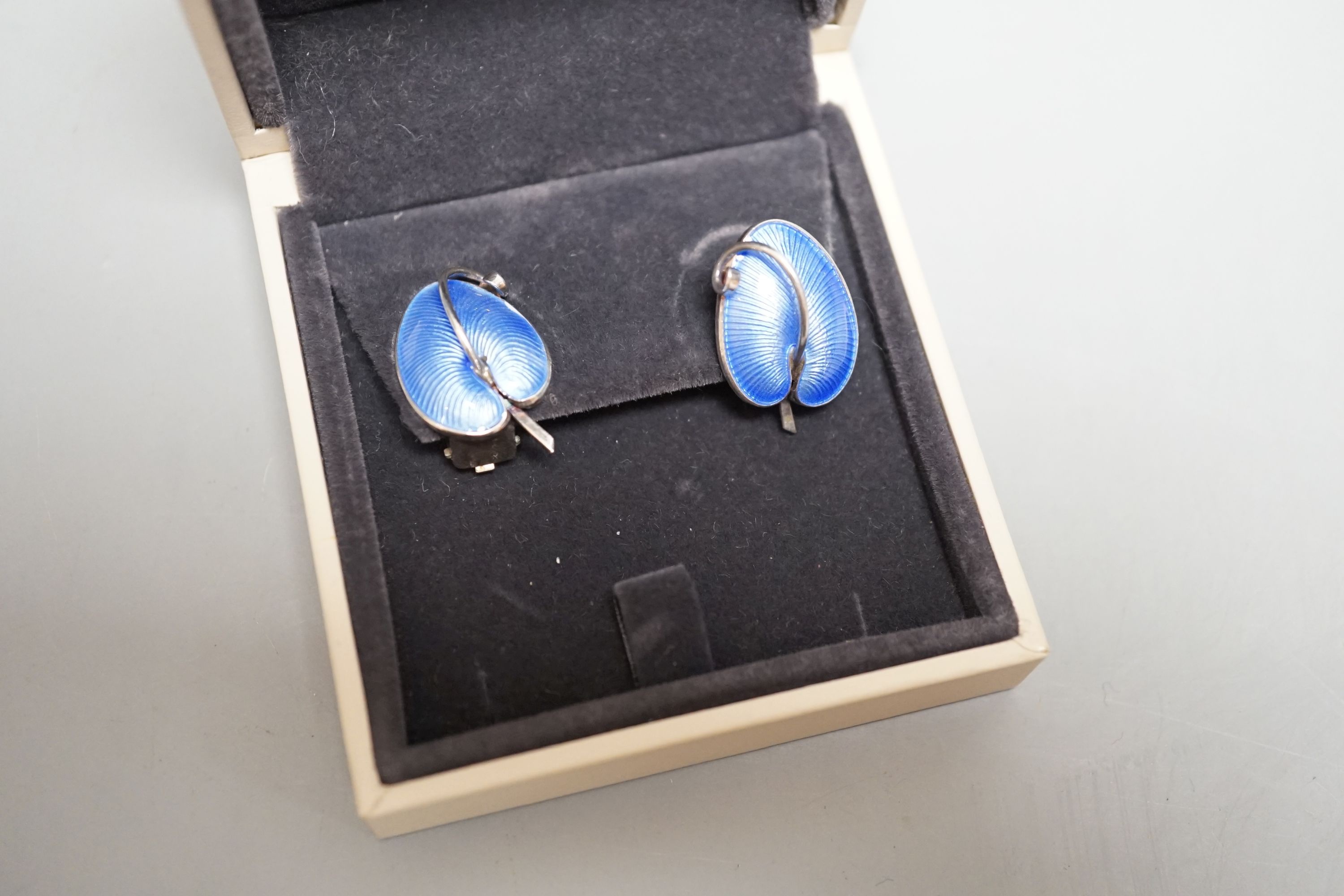 A pair of 20th century Danish sterling and enamel ear clips by Volmer Bahner & Co, 21mm and similar brooch, 47mm.